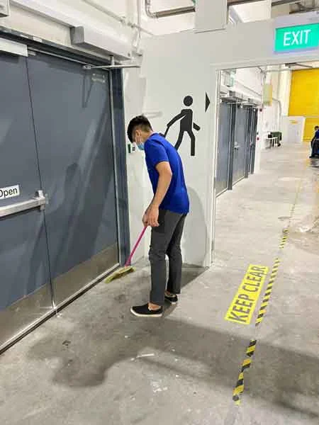 Picture of a Cleaning Staff performing Factory Cleaning